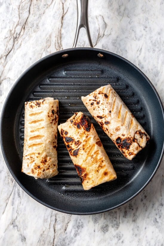 Breakfast burritos in grill pan