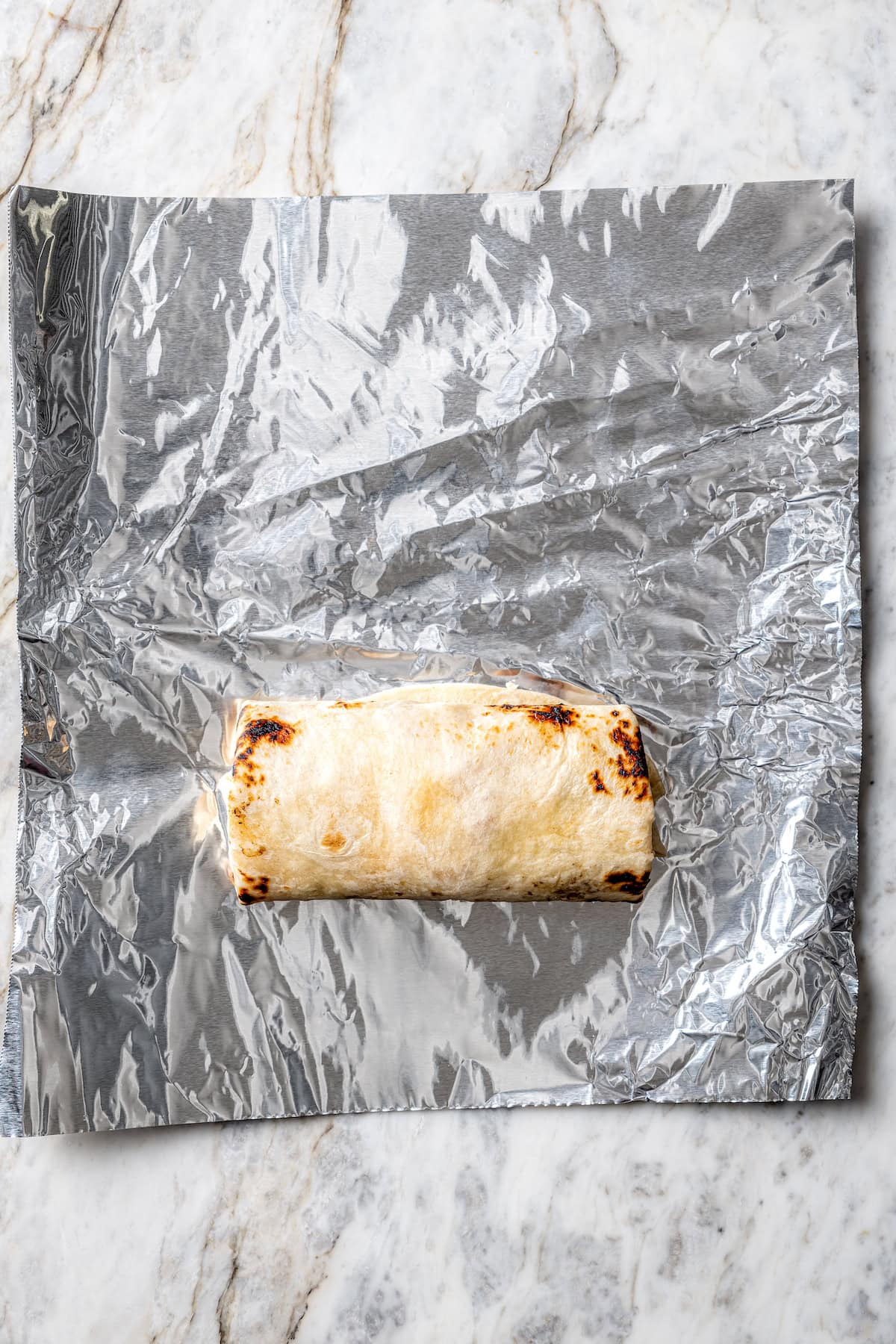 Breakfast burrito on foil