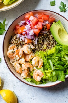 These quick and easy Lemon-Chili Shrimp Avocado Quinoa Bowls are great for lunch or dinner, or make them ahead for meal prep!