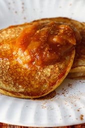 These whole wheat pancakes are lightly seasoned with brown sugar, pumpkin pie spice, vanilla, and topped with pumpkin butter for a hearty Autumn breakfast. Low fat, high in fiber and just plain good or you!