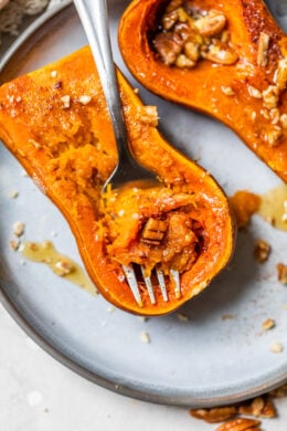 Roasting honeynut squash with a fork.